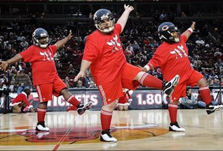 Bears' offensive line perform as 'Chicago Matadors' during halftime of Bulls-76ers  game